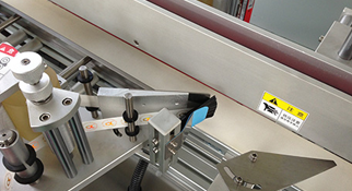 封口貼標機是什么，有什么特點？