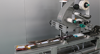 蘇州貼標機在果干行業的應用！